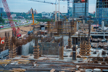 Construction of multi-storey buildings with cranes. Kazan, Russia - 15 Aug 2024