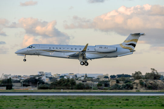 Luqa, Malta - November 16, 2024: AllJet Taxi A&eacute;reo Embraer Legacy 650 (EMB-135BJ) (REG: PR-JDJ) landing on a cloudy evening.