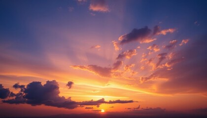 a view of a sunset with clouds and a boat in the water