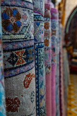 Handmade rugs display in a shop in Tangier, Morocco