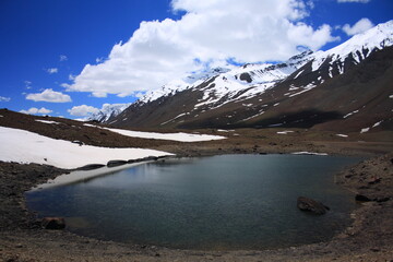 An alpine lake of Baroghil valley during summer in Pakistan