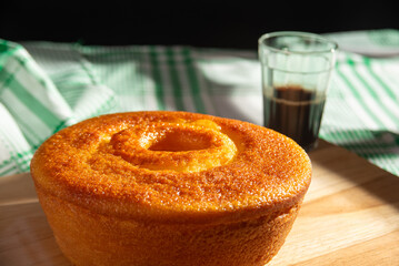 Orange cake, a beautiful sunny breakfast table and delicious Orange cake, selective focus.
