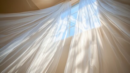Sheer White Curtains Flowing in a Breeze Near a Window