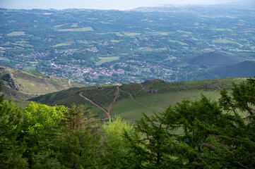 Obraz premium Travelling by old wooden train up to Larrun or La Rhune, Larhune mountain at the western end of the Pyrenees located on border of France and Spain, in traditional Basque provinces Labourd and Navarra