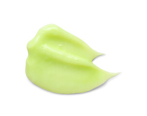Smear of green cosmetic cream on white background