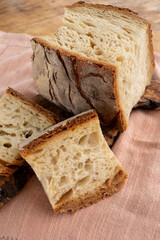 Freshly baked big sourdough traditional italian bread on olive wood fired oven