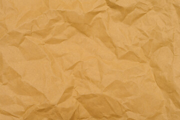 Crumpled brown paper texture full frame