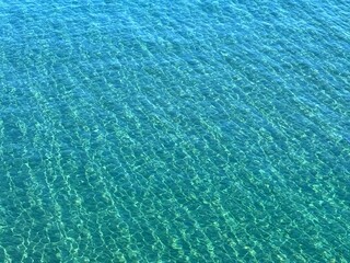 Sea water amazing clear blue surface.
