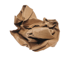 Crumpled cardboard disposable plate, isolated on white, eco friendly, clipping path