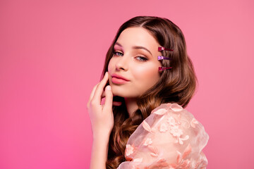 Adorable sweet cute girl preparing for prom occasion celebration showing professional make up on pink color background © Beauty Hero