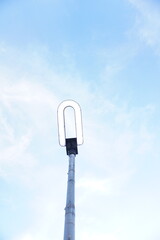 Street lamp on a blue sky