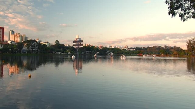 Ipago Lake of Londrina city, Parana, Brazil. Beautiful landscape at the end of the afternoon on the shore of the lake.