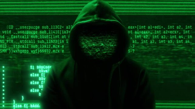 Hooded figure in green terminal light. Malware analysis, virus research and reverse engineering