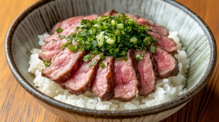 Deliciously Cooked Sliced Beef Served on a Bed of Steamed White Rice Garnished with Fresh Chopped Green Onions in a Stylish Bowl for a Culinary Delight