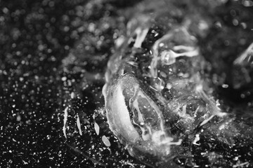 Macro shot of tiny particles in tap water