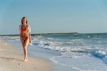 Sun-Kissed Serenity: Radiant Beauty Relaxes on the Beach in Style