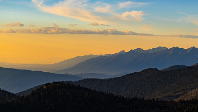 Yellow and blue sunset in the mountains