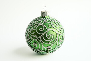Green Christmas bauble with silver glitter swirls
