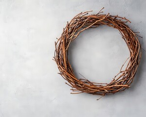 Wreath made of grapevine branches, no decoration, isolated on light background, Christmas wreath, rustic minimalist holiday decor