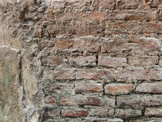 Old red brick wall, Vintage brick texture. Abstract blank background. Bricklaying, construction and masonry concept