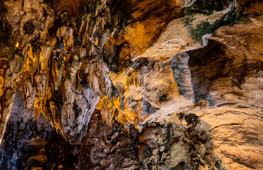 Buddhist cave temple close up stone walls southeast asia