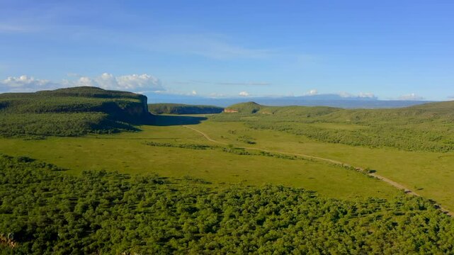 Drone footage from Africa. An aerial view showcases the lush greenery and diverse landscapes of Hells Gate National Park, featuring unique formations and breathtaking vistas that captivate observers.