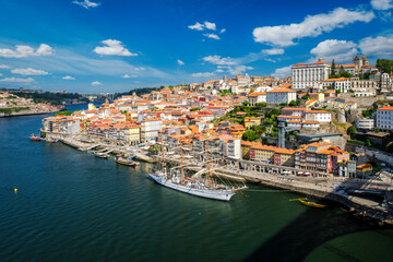 Aerial view of Porto city and Douro river with moored sailling ship from Dom Luis bridge I. Porto, Portugal