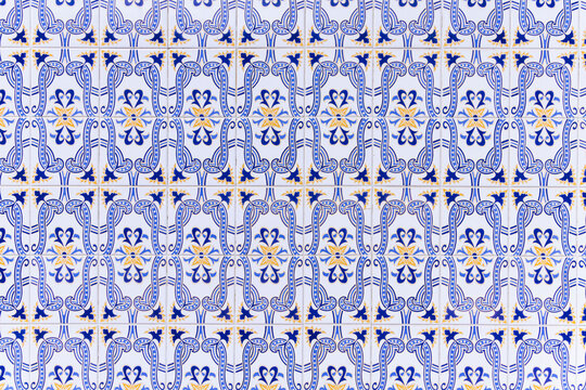 Portugal, Aveiro, Gafanha da Nazare. Traditional hand painted azulejos tiles decorating a building in Gafanha da Nazare.
