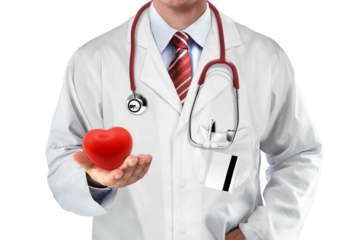Male doctor hold heart shape exercise ball