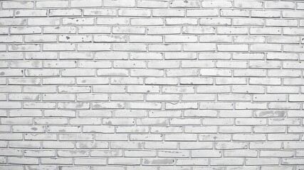 Obraz premium Textured brick wall with a muted white and gray color scheme bearing visible signs of aging and wear, grunge, rustic, earthy tone