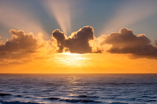 Sunset clouds over the Pacific Ocean at Cape Disappointment State Park, Washington State, USA.
