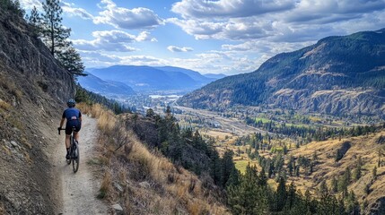 A cyclist on a mountain trail, taking in the breathtaking view of a valley below, representing a balance of fitness and connecting with nature