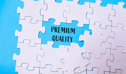 Fototapeta premium Puzzle with a piece missing and the word premium quality written in the gap