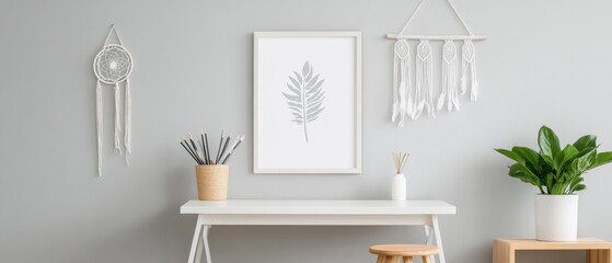 minimalist home office decor with plants and wall art