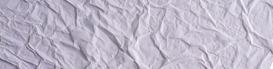 white crumpled and creased glued wrinkled paper poster texture background