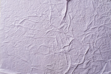white crumpled and creased glued wrinkled paper poster texture background
