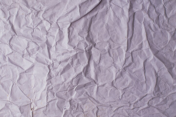 white crumpled and creased glued wrinkled paper poster texture background