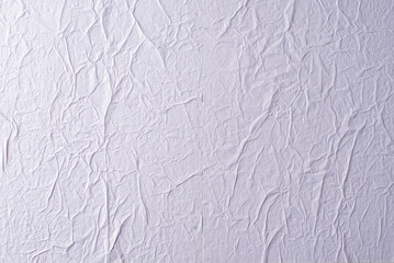 white crumpled and creased glued wrinkled paper poster texture background