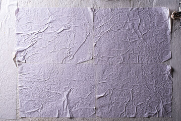 white crumpled and creased glued wrinkled paper poster texture background