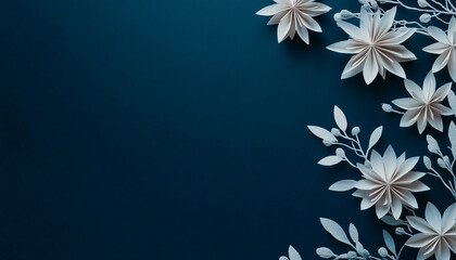 Elegant white paper flowers arranged on a deep blue background with copy space 