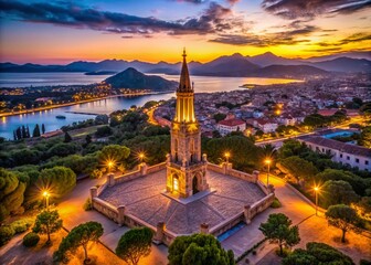 Fototapeta premium Serene Low Light Capture of Karl I Monument in Alcudia, Mallorca, Highlighting Historical Architecture Under a Twilight Sky