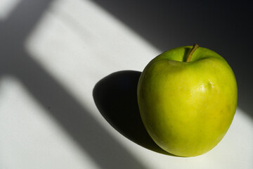 green apple on black background