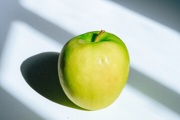 green apple on a plate