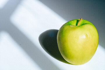 green apple on a plate
