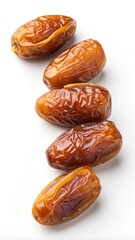Obraz premium Fresh medjool dates on white background displaying natural texture