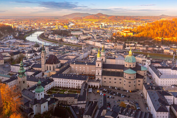 An aerial view of Salzburg, Austria, showcasing the historic old town, Salzburg Cathedral, and nearby landmarks