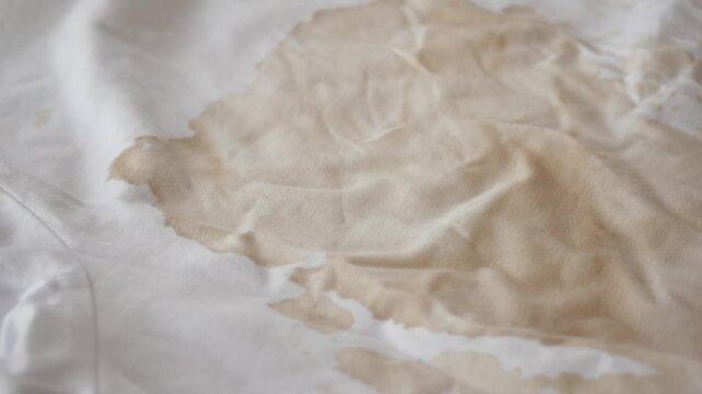  spilled coffee on a white shirt