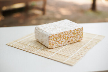 Raw tempeh, is a food made from fermented soybeans, a popular food among Indonesian people