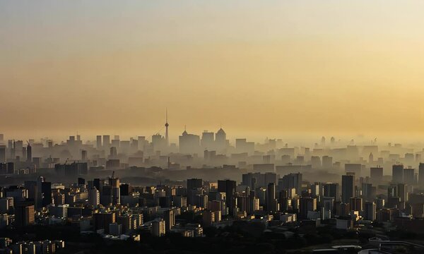 Smoggy Cityscape Under Polluted Sky