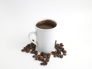 cup of coffee with beans